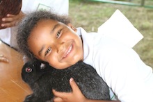 4-H participant with rabbit